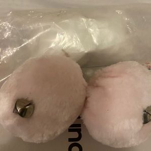 Two pairs of Pom Poms for girls skates